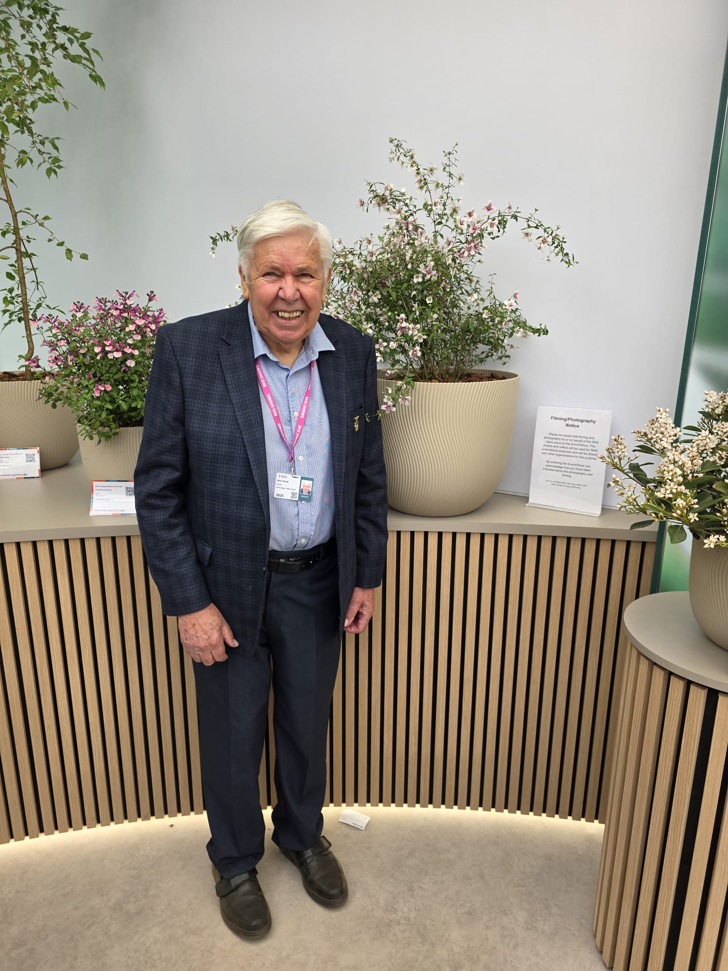 Proud breeder Alan Postill with Philadelphus Petite Perfume Pink.jpg